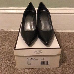 Women’s black coach heels
